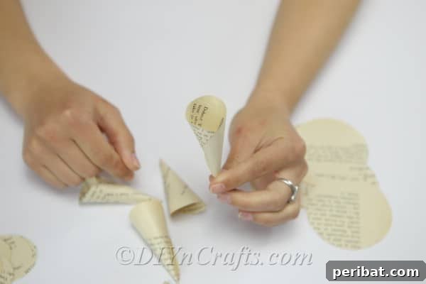 Literary Blooms: Crafting Flowers from Old Book Pages 11 Keep working on the paper cones.