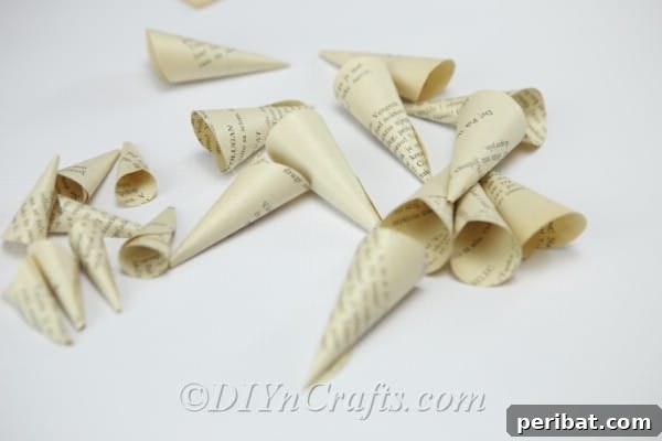 Literary Blooms: Crafting Flowers from Old Book Pages 12 When you have finished making the cones you believe you need for one flower, you can proceed to the next step.
