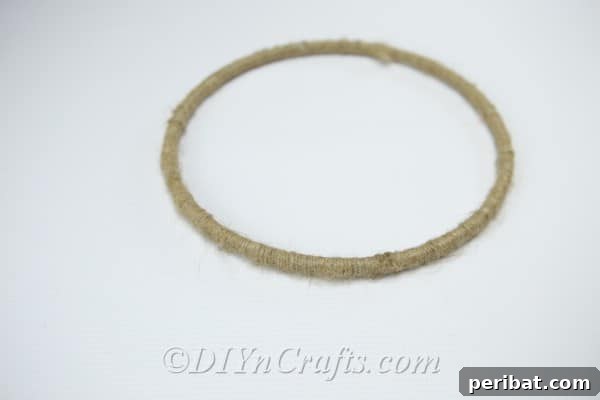 Crafting Your Own Rustic Wind Chime 9 This is what your wooden hoop will look like after it is wrapped in twine.