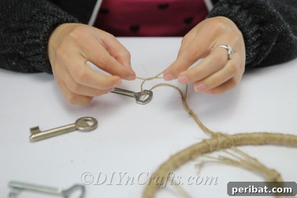 Crafting Your Own Rustic Wind Chime 13 Tie keys onto strands of twine.