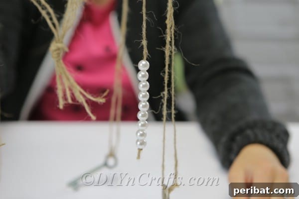 Crafting Your Own Rustic Wind Chime 16 Add as many beads as you want.