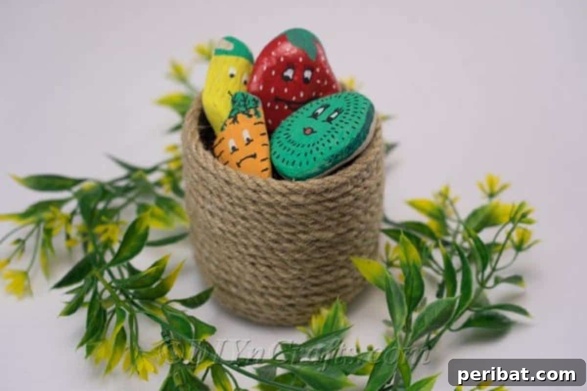 Charming Hand-Painted Stone Garden Labels 3 It’s easy and fun to paint rocks to create garden markers, showcasing a variety of colorful fruit-themed rocks.