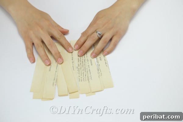Cut out multiple paper strips, preparing them for petal formation.