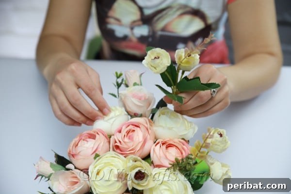 Floral Magic in a Teacup 15 Persist in adding and arranging flowers until your teacup floral decor is full and aesthetically pleasing.
