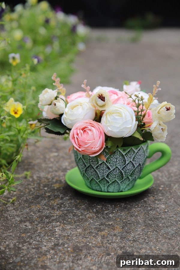 Floral Magic in a Teacup 18 Enjoy your completed teacup floral decor, a delightful addition to any room.
