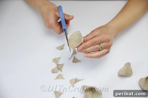 Trim away excess from the top of each of the egg cups to create smooth, truncated cone shapes.