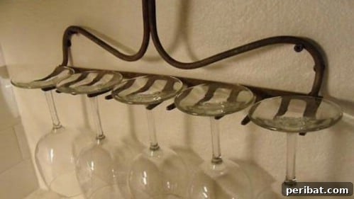 15 Ingenious Upcycled Wall Hooks 17 Iron Rake Wall Hook - 15 Unusual and Creative Repurposed Wall Hooks