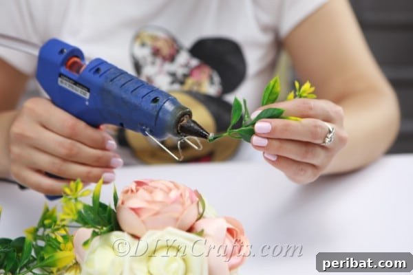 Apply a small amount of glue to the ends of the sprig stems.