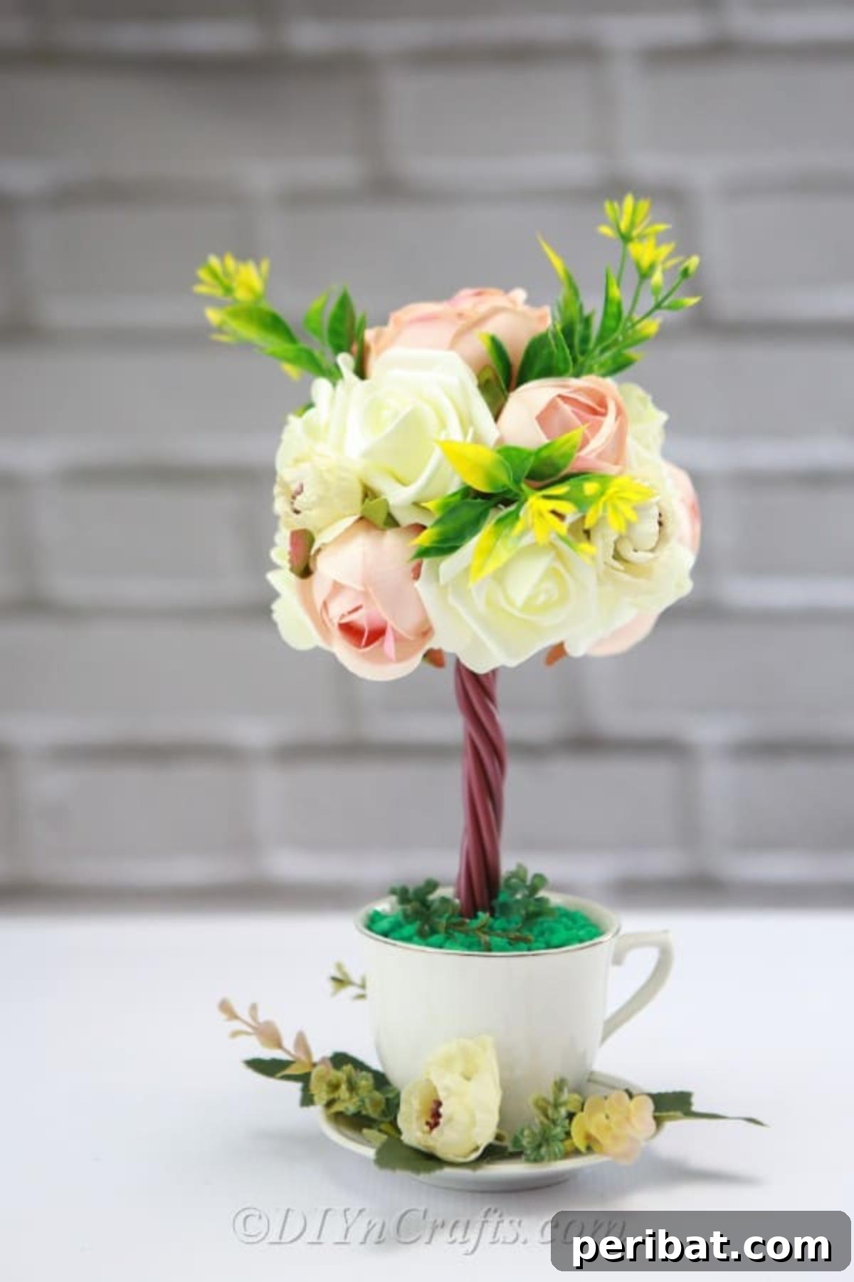 Crafting a DIY topiary tree flower arrangement is an enjoyable and easier project than you might expect.
