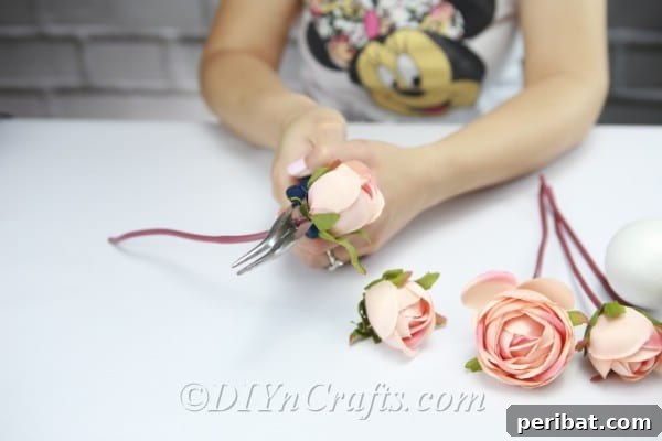 Cut off the stems of the flowers using diagonal pliers, leaving a small stub.