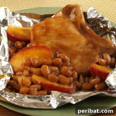 The Ultimate Summer Grilling Guide: 40 Irresistible Recipes 35 Pork Chop Apple Bean Packets