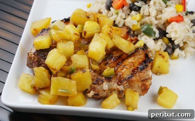 The Ultimate Summer Grilling Guide: 40 Irresistible Recipes 7 Chili Rubbed Pork Chops with Pineapple Salsa