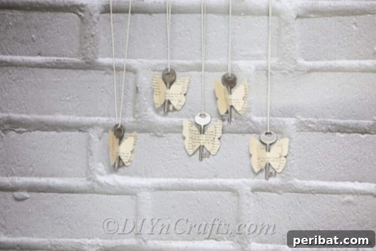 DIY Rustic Butterfly Art from Upcycled Books 3 Assortment of old book butterflies displayed against a light background.