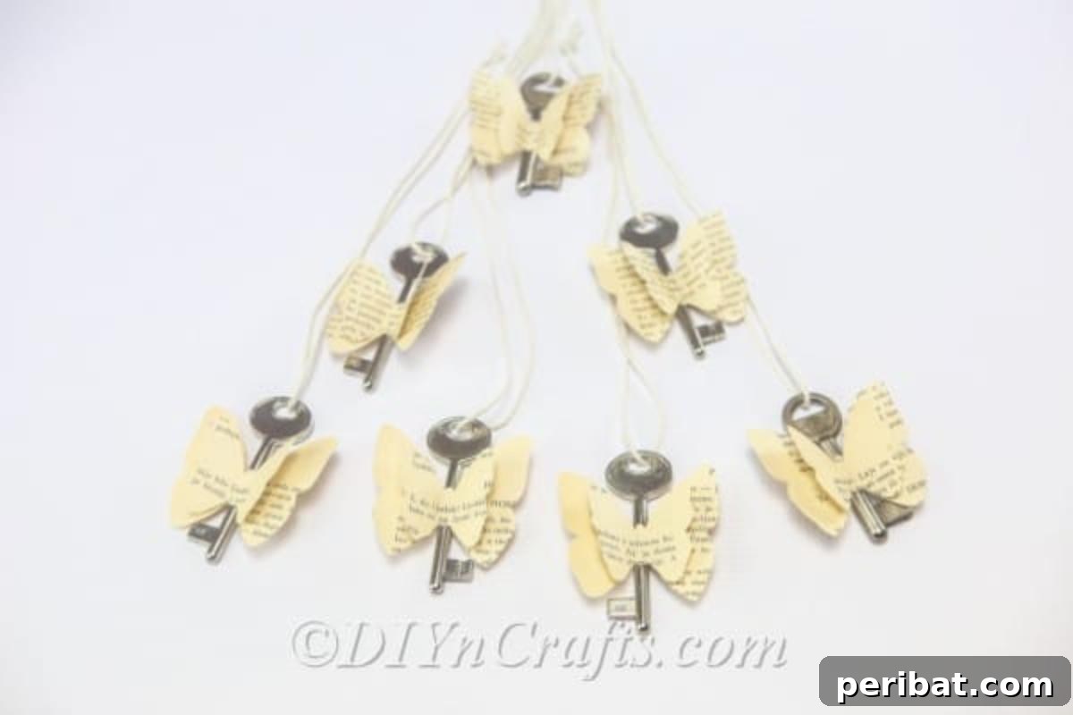 DIY Rustic Butterfly Art from Upcycled Books 4 Rustic butterflies made with old book pages and vintage keys are ready to hang.