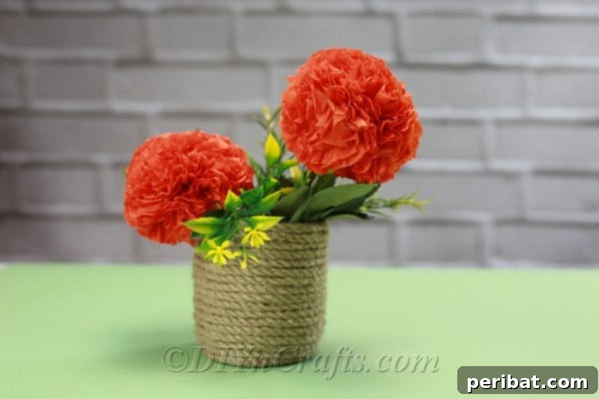 Vibrant tissue paper flowers create a beautiful display against a minimalist wall, showcasing their decorative potential.
