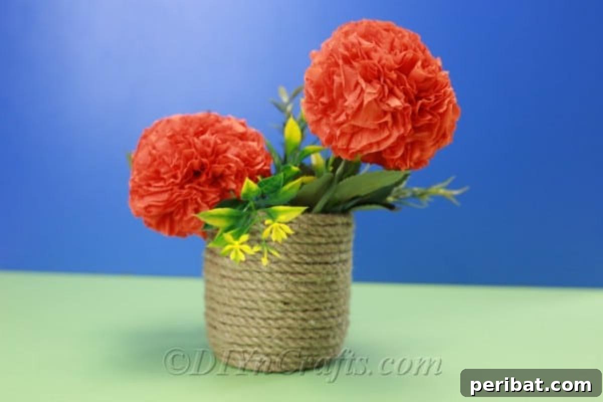 A charming basket filled with colorful tissue paper flowers, set against a serene blue backdrop, highlighting a rustic aesthetic.