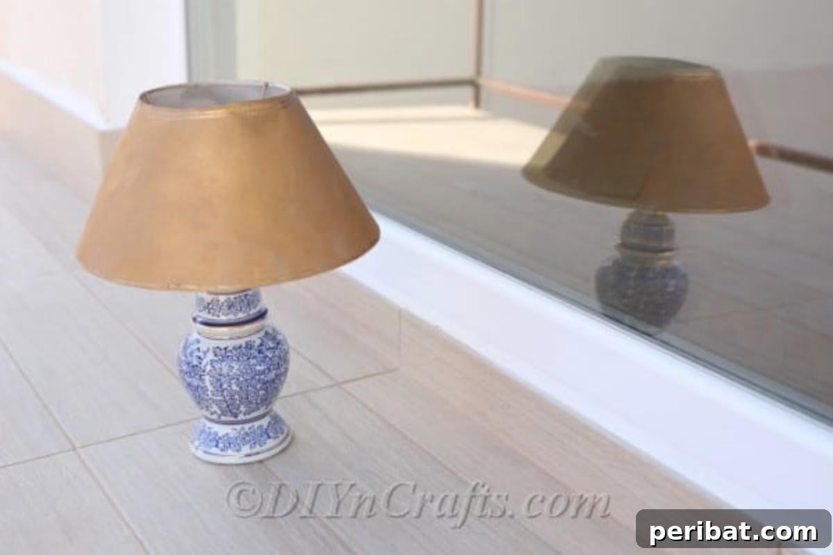 A custom-made solar garden lamp stands proudly on a patio, ready to cast its inviting glow after sunset.