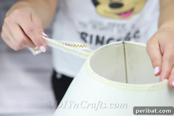A final check ensures all unwanted elements are gone, leaving the lampshade ready for its transformation.