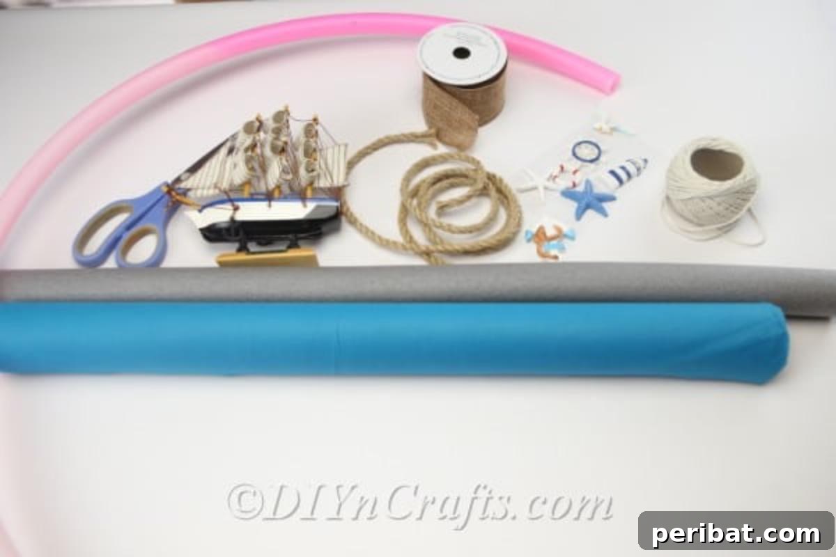 Coastal Elegance: Craft Your Perfect Summer Wreath 4 A flat lay photograph showcasing all the essential materials for crafting a DIY nautical wreath: blue fabric, rope, rustic ribbon, a miniature boat, seashells, beads, scissors, and a hot glue gun.