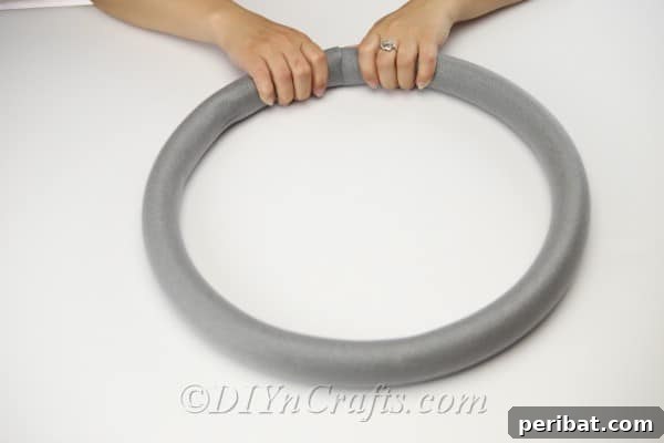 Coastal Elegance: Craft Your Perfect Summer Wreath 9 Connect the two ends of the hoop together, enclosing the foam, to form a sturdy wreath shape.