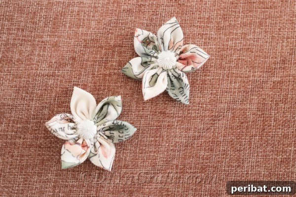 A beautifully handcrafted fabric flower, ready to add a personal touch to any item.