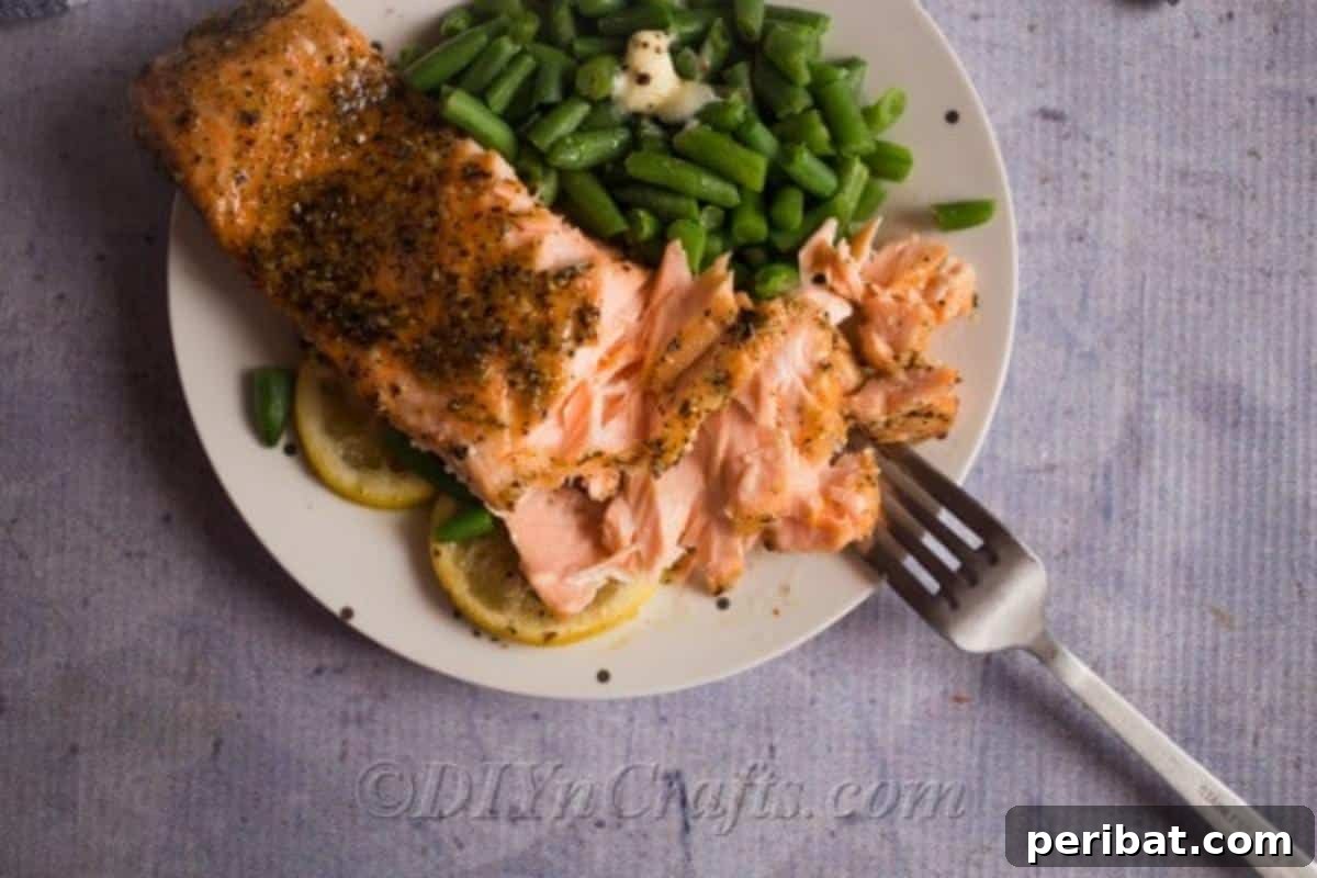 Perfectly Glazed Honey Garlic Salmon 3 Best baked salmon on a plate with green beans