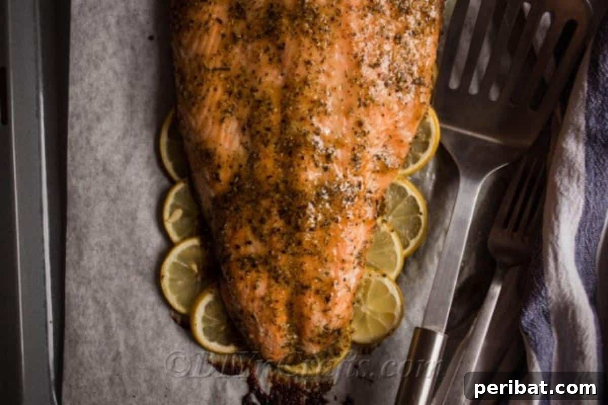 Perfectly Glazed Honey Garlic Salmon 9 Salmon on a bed of lemons ready to be served
