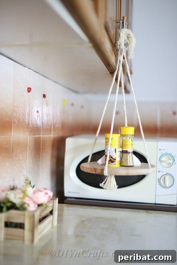 Make Your Own Decorative Hanging Shelf 15 A charming hanging shelf positioned in the kitchen, adding both decor and utility with a microwave in the background.