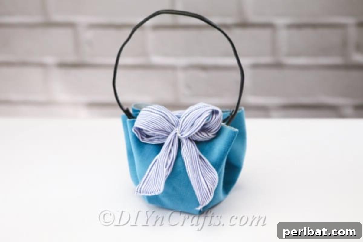 Craft a Trendy Handbag Without a Needle 3 A stylish DIY handbag displayed against a subtle wall backdrop, highlighting its unique design.