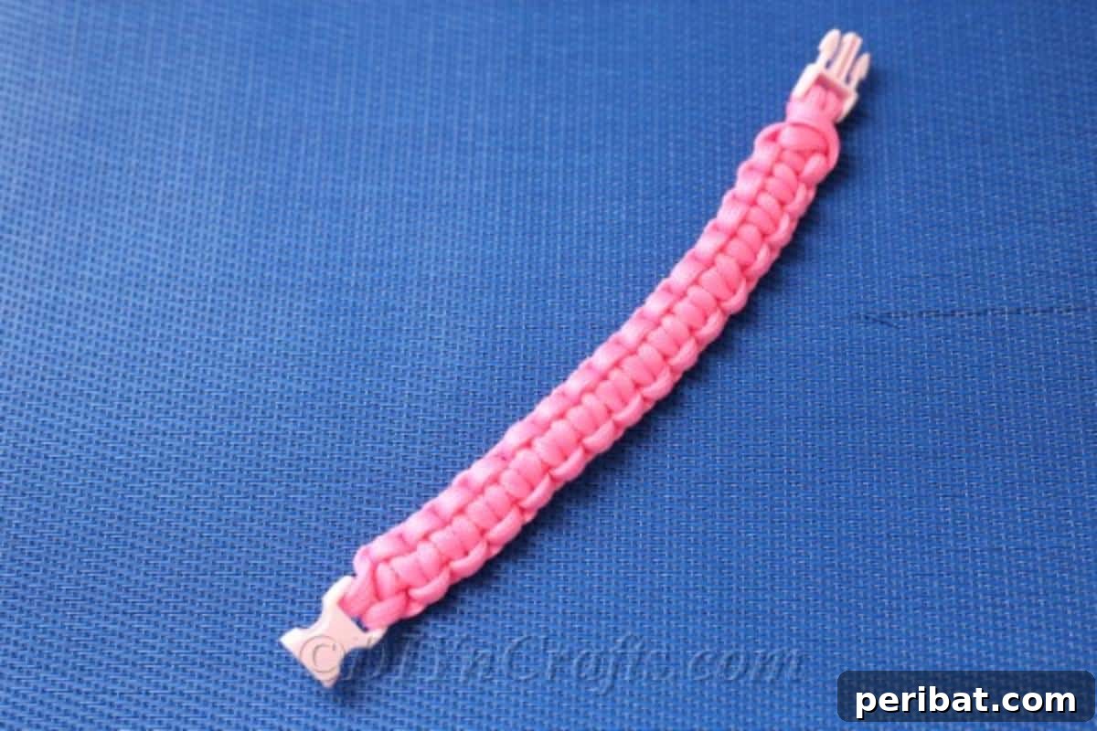 Create Your Own Square Knot Friendship Bracelet 9 Finished square knot bracelet friendship bracelet laying on a blue surface