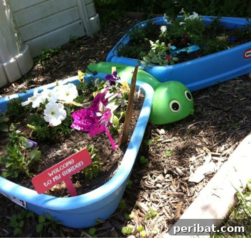 Stunning & Simple DIY Flower Bed Projects for Outdoor Appeal 11 Kiddie Pool Flower Bed for a whimsical garden