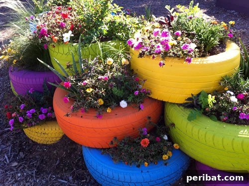 Stunning & Simple DIY Flower Bed Projects for Outdoor Appeal 17 Old Tire Flower Bed painted in vibrant colors