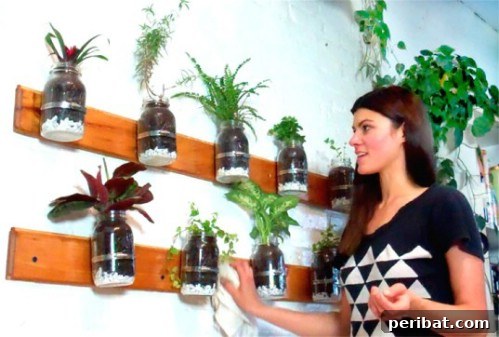 Stunning & Simple DIY Flower Bed Projects for Outdoor Appeal 22 Mason Jar Gardening on a fence or wall