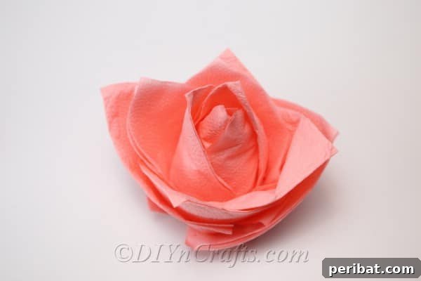 Fold Beautiful Napkin Roses 13 Completed flower napkin from how to fold a napkin tutorial