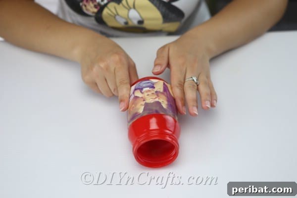 Create Stunning Photo Vases with Your Memories 9 Adhere the photograph to your jar.