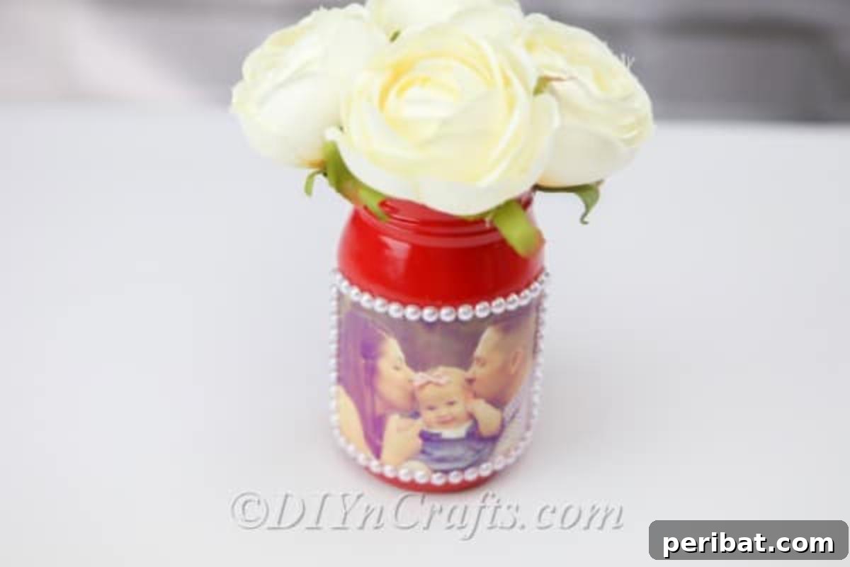 Create Stunning Photo Vases with Your Memories 4 A DIY jar vase with flowers in it
