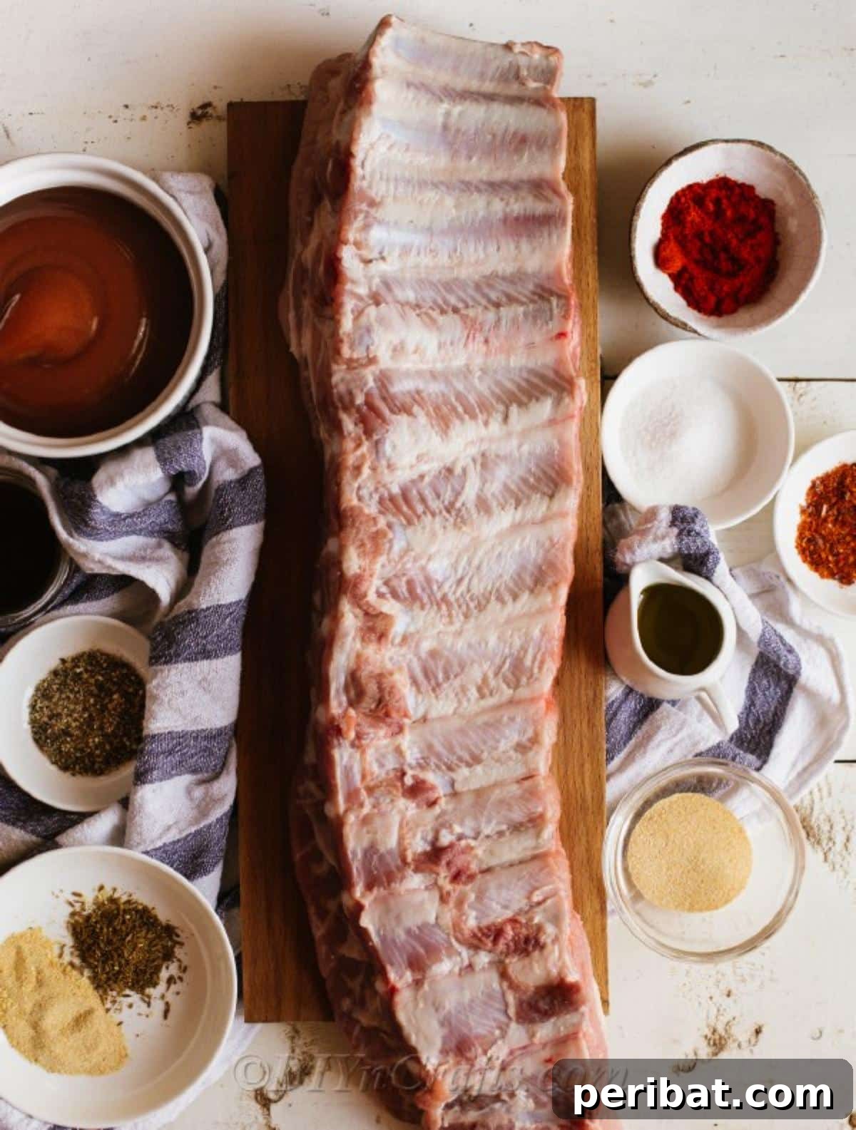 Effortless Fall-Off-The-Bone Oven Ribs 7 Assortment of fresh ingredients laid out for making delicious BBQ oven baked ribs