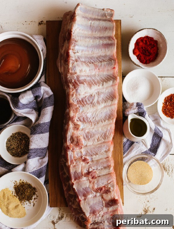 Effortless Fall-Off-The-Bone Oven Ribs 10 Ingredients laid out for preparing delicious BBQ oven baked ribs
