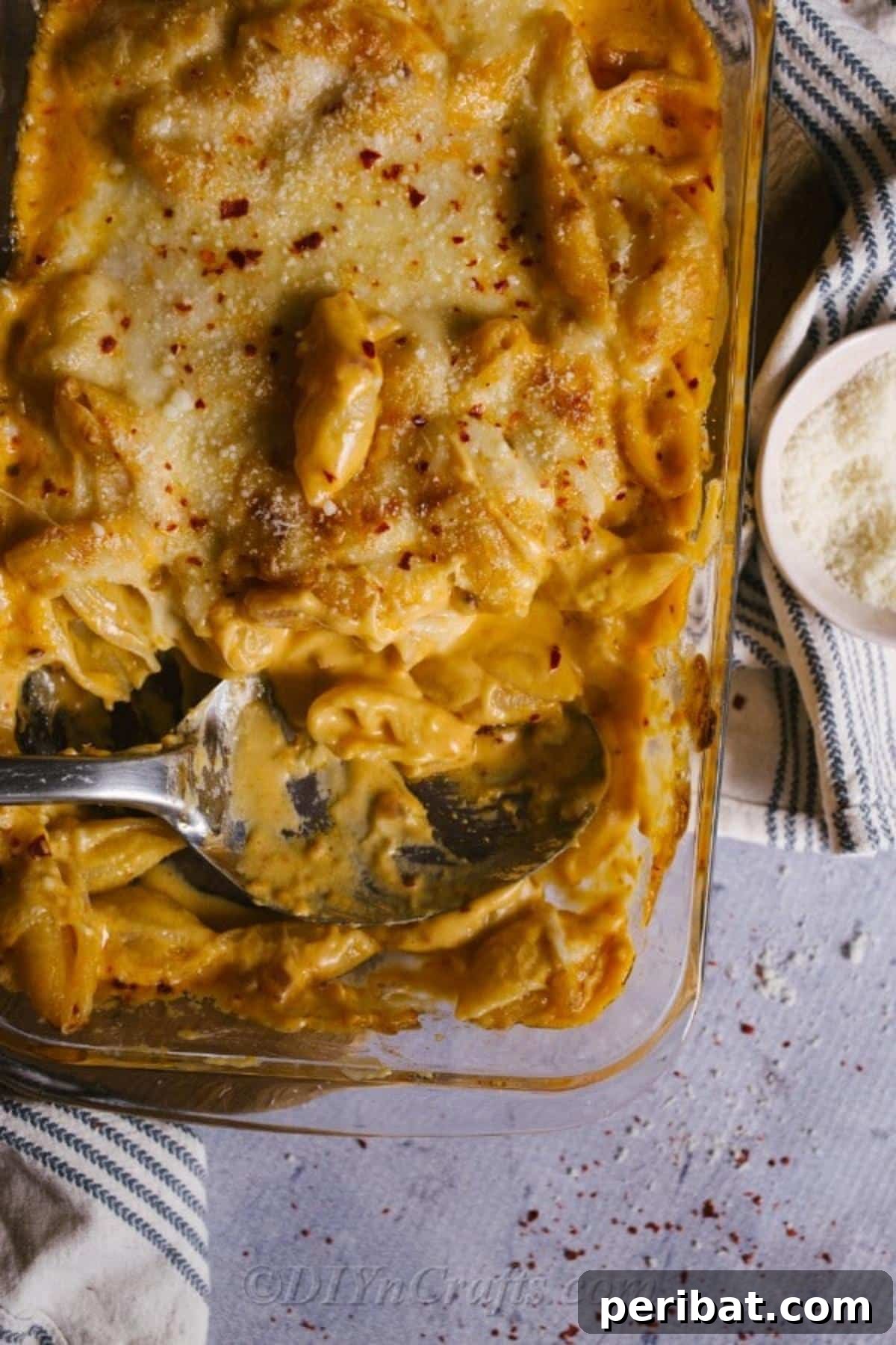 Decadent Homemade Mac and Cheese Bake 4 An overhead view of a large casserole dish brimming with perfectly cooked and sauced homemade baked mac and cheese, ready for the oven.
