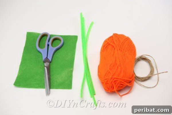 Handmade Autumn Yarn Pumpkin Garland Tutorial 12 Supplies for yarn pumpkin garland laying on flat white surface
