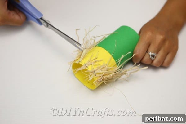 Trimming hay for scarecrow hair