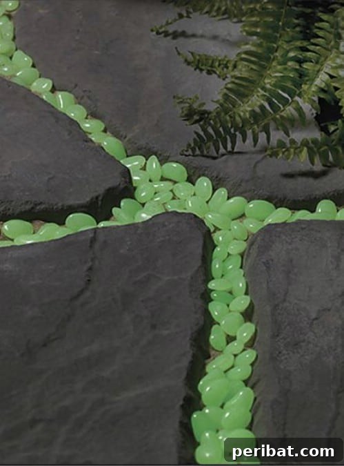 70 Genius Summer Backyard DIYs to Elevate Your Outdoor Space 15 Fill Walkway Cracks with Glow in the Dark Pebbles