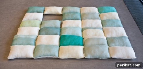 70 Genius Summer Backyard DIYs to Elevate Your Outdoor Space 18 Make a Huge Quilt Pillow