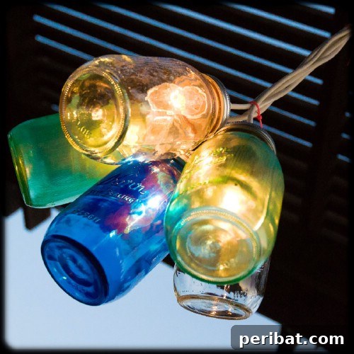 70 Genius Summer Backyard DIYs to Elevate Your Outdoor Space 31 Make a Canning Jar Chandelier