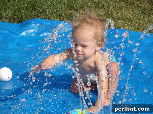 70 Genius Summer Backyard DIYs to Elevate Your Outdoor Space 42 Make a DIY Splash Pad for the Kids