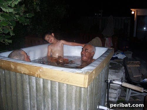 70 Genius Summer Backyard DIYs to Elevate Your Outdoor Space 58 Build Your Own Wood Fired Hot Tub