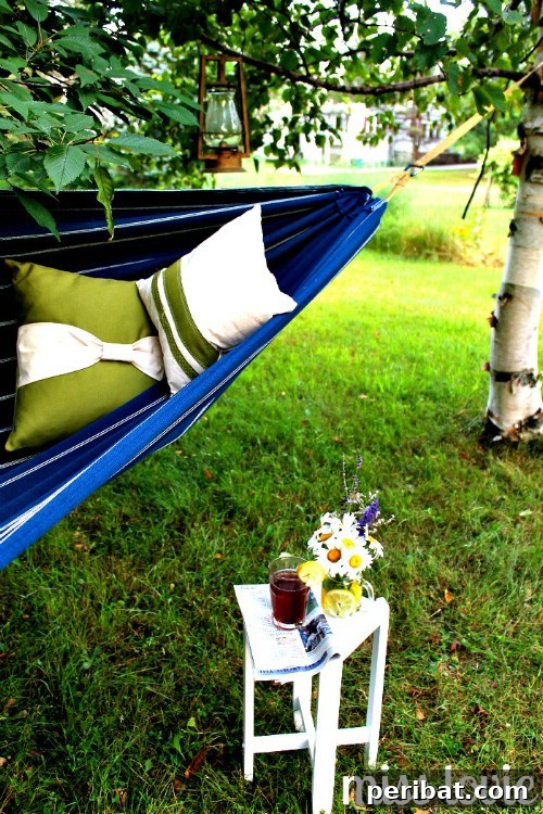 70 Genius Summer Backyard DIYs to Elevate Your Outdoor Space 68 Add a Hammock to the Backyard