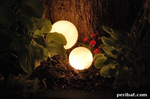 70 Genius Summer Backyard DIYs to Elevate Your Outdoor Space 10 Create Glowing Outdoor Orbs