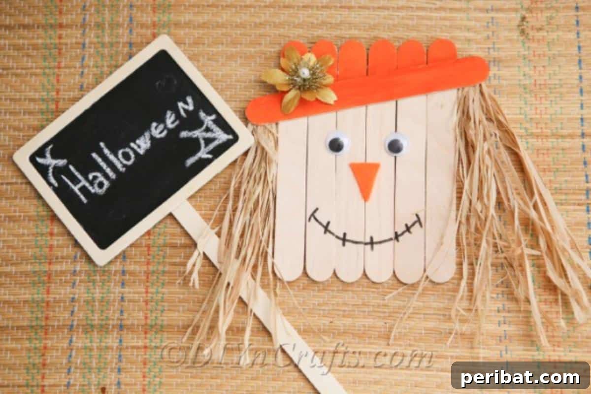 How to make a scarecrow out of craft sticks sitting on a cloth with a halloween sign