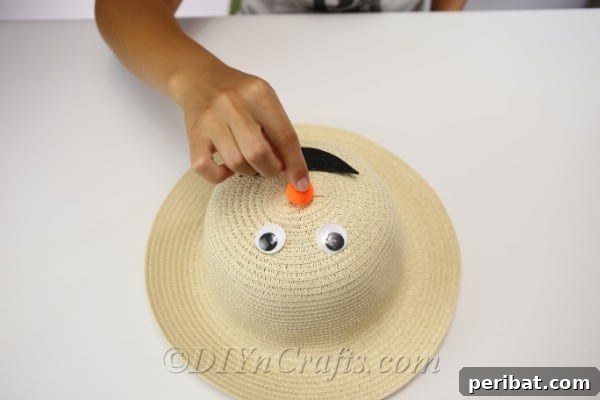 Adding a face to your straw hat scarecrow